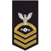 Navy E7 MALE Rating Badge: Construction Mechanic - seaworthy gold on blue