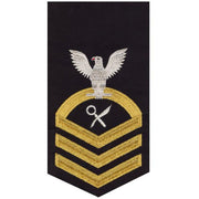 Navy E7 MALE Rating Badge: Intelligence Specialist - seaworthy gold on blue